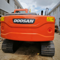 Excavatrice sur chenilles Doosan DX140 140 d'occasion à bon prix à vendre