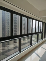 Porte pliante panoramique moderne en alliage d'aluminium à ouverture verticale, isolation thermique, insonorisation, balcon fermé
