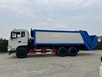 Camion à ordures compacteur d'occasion de 20 mètres cubes à double essieu arrière, châssis Dongfeng, moteur Yuchai, boîte de vitesses rapide à 8 rapports avec réservoir d'eaux usées
