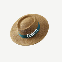 Vente en gros de chapeaux de paille pour femmes été surdimensionné soleil naturel herbe seau pliable Panama personnalisé OEM canotier de luxe personnalisé