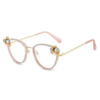 La plus récente vente en gros de lunettes de luxe en diamant anti-lumière bleue Oeil de chat fabrique des lunettes à lumière bleue pour hommes