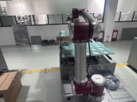 Station de manutention automatisée par robot de coopération homme-machine pour le chargement et le déchargement, bras robotique, machine de fraisage CNC pour ligne d'assemblage