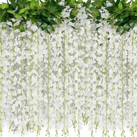 Meilleure vente : Guirlande de glycine artificielle en soie pour mariage, décoration de la Saint-Valentin, accessoires de photographie extérieure, fleurs artificielles haut de gamme en gros