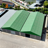 Tente de stockage industrielle robuste verte pour entrepôt, abri de grande capacité avec structure en aluminium, portable pour le stockage de matériaux en usine