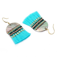 Boucles d'oreilles pendantes classiques rétro bohèmes ethniques faites à la main en coquillages naturels avec pompons, vente directe d'usine, version personnalisée