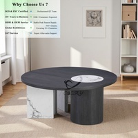 Mesa de Centro Moderna Minimalista de Forma Redonda en Contraste Blanco y Negro, con Soporte Estable y Estética de Alta Gama