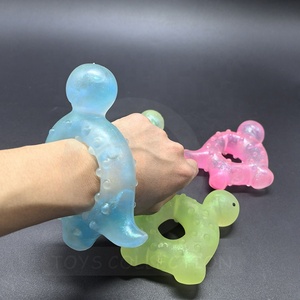 Venta al por mayor promocional Squeeze Dino <span class=keywords><strong>pulsera</strong></span> juguete elástico personalizado antiestrés regalos blandos con maltosa en el interior hecho de plástico - Product Image 4