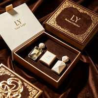 Boîte d'emballage personnalisée pour flacon de parfum magnétique avec revêtement UV, gaufrage, doublure en éponge, logo personnalisé haut de gamme