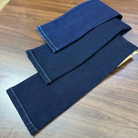 Tissu denim extensible tissé Lizhi automne-hiver bleu-noir 85 % coton sergé 3/1 en rouleau pour vêtements et sacs pour garçons