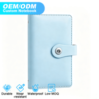 Personnalisation en gros d'ensembles de cahiers en usine, disponibles en plusieurs couleurs, avec logo et motifs personnalisables, impression durable et claire.