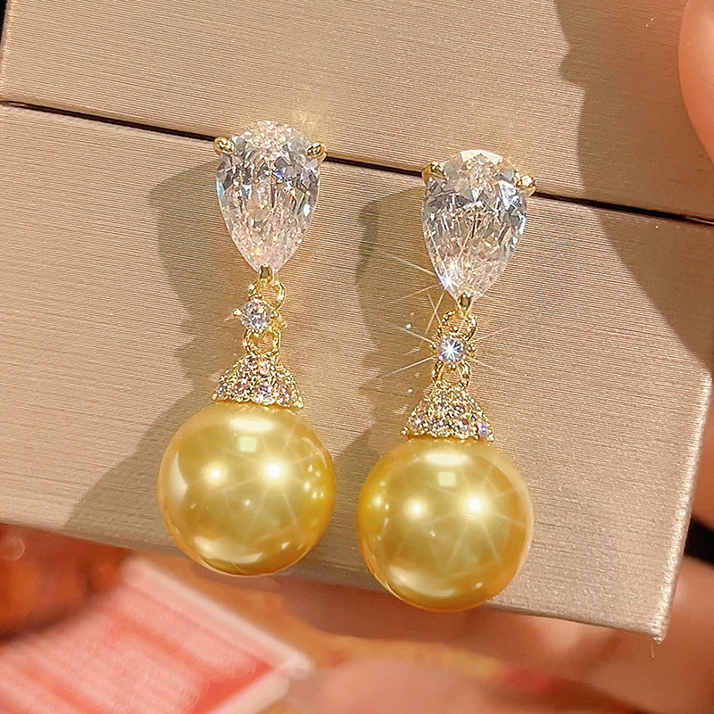 Boucles d'oreilles boules dorées