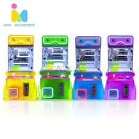 Machine à griffes ultra-mini en forme de bec de canard, machine à griffes en plastique commerciale avec capsules pour les joueurs en vente