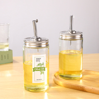 Bouteille en verre cylindrique de 500 ml avec bec verseur en acier inoxydable et couvercle pour le stockage d'huile de cuisson, utilisation en restaurant et en cuisine