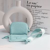 Nouveau 2 en 1 PU double bracelet porte-clés portefeuilles dames étanche porte-carte de crédit Mini sac à main en cuir accessoires pour femmes