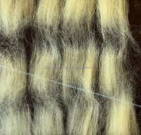 Machine à carder les fibres d'aramide pour l'ouverture des matériaux d'aramide, machine textile pour fibres spéciales