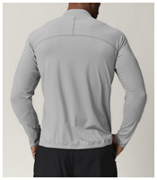Haut de sport doux et extensible à manches longues avec fermeture éclair intégrale, col montant, poches latérales, pull respirant et anti-transpiration pour hommes