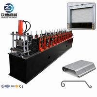 Machine de formage à froid pour la fabrication de lames de portes enroulables en métal de qualité supérieure et de rails de portes enroulables en acier