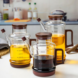 Distributeur d'huile en verre borosilicate avec poignée en bois et échelle graduée, bouteille d'huile en verre résistant à la chaleur pour cuisine, huile et <span class=keywords><strong>vinaigre</strong></span> - Product Image 1
