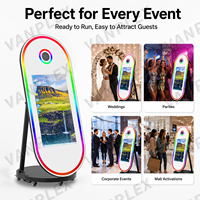 Machine de photomaton ovale 60 pouces avec écran tactile 32 pouces, miroir magique, appareil photo reflex numérique, lumière RVB et impression instantanée pour location de mariage
