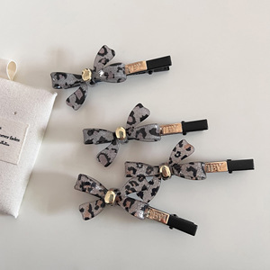 กิ๊บติดผมลายเสือดาวอะซิเตทแฟชั่นสำหรับผู้หญิงแบบหนีบด้านข้าง - Product Image 1