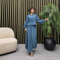 Set 2 Potong Warna Biru Debu Musim Gugur 2026 Grosir, Blus Kerah Mandarin Berumbai dan Rok Maxi A-Line yang Mengembang, Elegan untuk Wanita