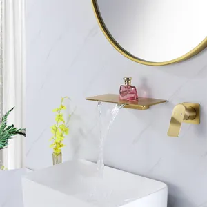 Grifo de baño de lujo de diseño moderno, mezclador de lavabo de latón montado en la pared, oro pulido