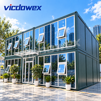 VICDOWEX Bureau Conteneur Modulaire Préfabriqué Moderne à Assemblage Rapide avec Mur Rideau en Verre Design Contemporain pour Salle d'Exposition et Réception