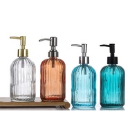Vorrätige Bunte 400ml Flüssigseifenspender-Flasche Luxuriöse Glas-Shampooflasche mit Goldpumpe Siebdruck Gesichtsreiniger