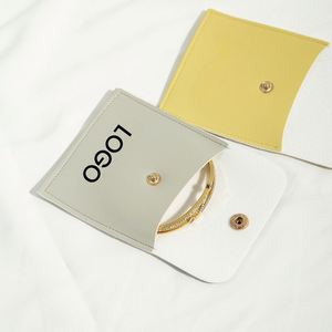 Sac à bijoux en cuir PU tendance avec bouton métallique pour emballage cadeau printemps/été et rangement de bijoux - Product Image 1