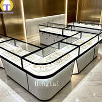 Vitrine de luxe personnalisée en verre avec serrure et éclairage LED pour bijouterie et magasin de détail en centre commercial