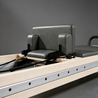 Machine de Pilates Reformer en bois massif à prix d'usine avec boîte de rangement et planche de saut pour studio