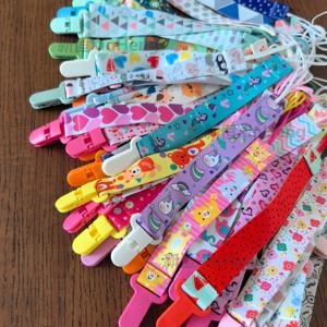 Sıcak satış renkli hayvan karikatür baskılı oyuncak sapanlar tasarım bebek emzik klip yeni bebek emzik klip zincir şerit kukla tutucu - Product Image 3