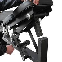 Banc de musculation professionnel de luxe avec accessoire unique pour le développement des jambes, idéal pour un entraînement efficace des membres inférieurs et le renforcement musculaire.