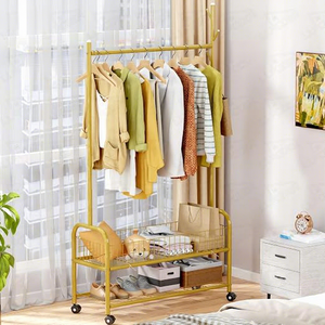 Modern Yellow Metal <b>Clothing</b> <b>Rack</b> With Double Tier Storage Shelf And Wheels For Living Room Use - Product Image 3
