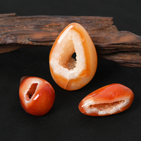 Vente en gros de cristaux d'oeufs de cornaline en géode d'agate rouge naturelle de haute qualité