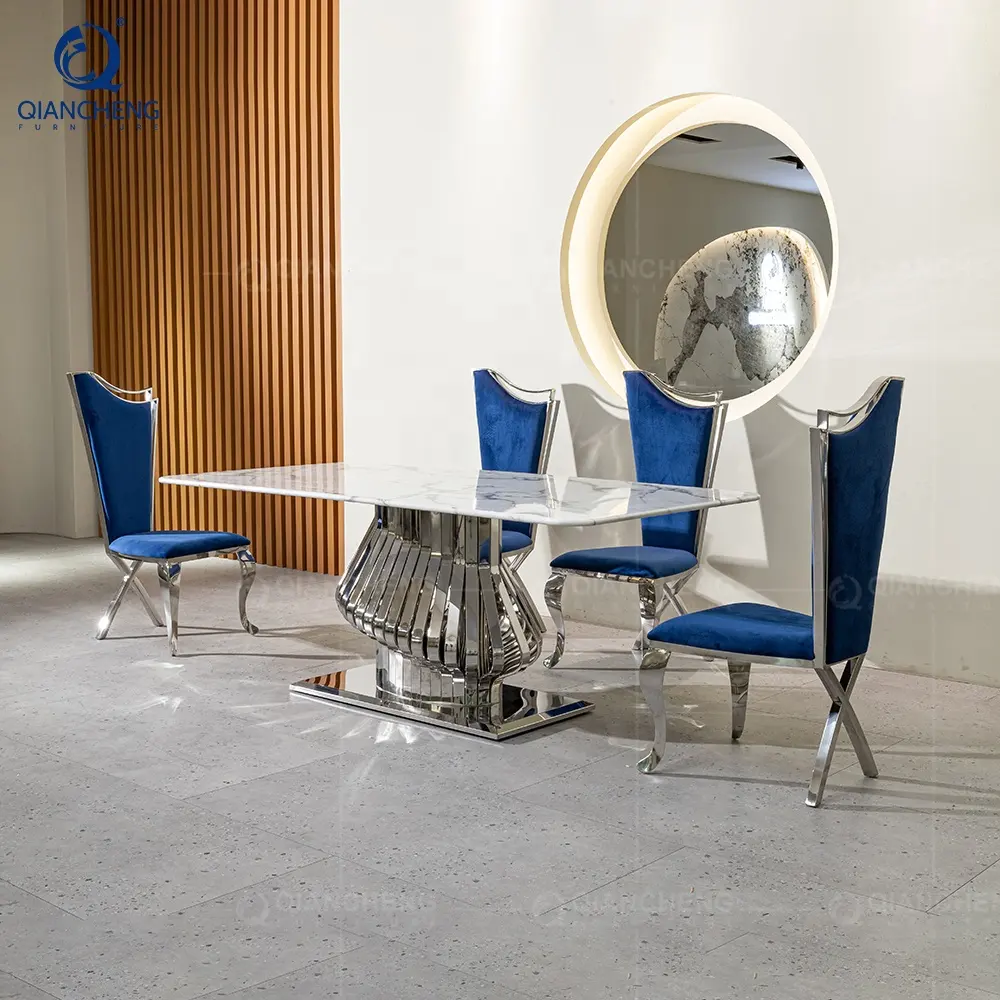 QIANCHENG mais recente design italiano mobiliário inoxidável luxo guangzhou 4 veludo azul cadeiras estofadas mármore mesa de jantar canelada