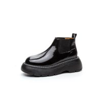 Bottines Chelsea en cuir vert signature pour femme, imperméables, à talon épais et plateforme, idéales pour les jours de pluie urbains et les trajets quotidiens élégants.