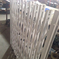 Grille coulissante de sécurité en aluminium rétractable
