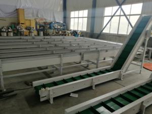 Sistema di trasporto a nastro piatto resistente trasportatore di legname e cartone con recinzione laterale - Product Image 6