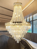 Lustre de luxe à hauteur réglable grande lampe suspendue intérieure en cristal creux pour villa salon et escalier
