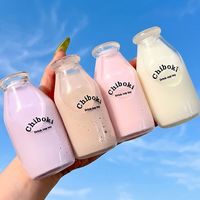 Jouet Squishy en forme de bouteille de lait, 4 couleurs, Macarons Kawaii, jouet à presser en forme de bouteille de thé au lait, cadeau pour fille avec perles