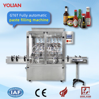 Machine de remplissage automatique pneumatique à piston GT6T-6G avec trémie mélangeuse 1000-5000 ml pour confiture, beurre de cacahuète, huile, sauce