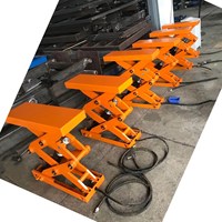 Depo fabrika yükleme ve bakım için 500kg elektrikli makaslı kaldırma tablası hidrolik mobil Platform kamyon