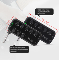 Mini amplificateur de casque pour guitare électrique et basse, portable et rechargeable, avec effet de réverbération à temporisation.
