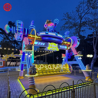 Manège à sièges groupés avec ceintures de sécurité individuelles, design de dessin animé, équipement pour les fêtes foraines et les parcs d'attractions familiaux