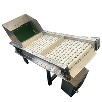 Transportador de cinta modular con deflector para transportar cubitos de hielo Filtrado automático de escoria de hielo y transportador de material de elevación