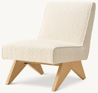 Fauteuil lounge sans accoudoirs en chêne massif, style simplicité moderne, avec cadre artisanal, rembourrage sur mesure, dossier incliné et pieds coniques en V inversé