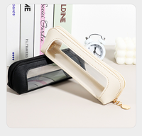 Sac de stylo en PU transparent minimaliste en trois dimensions sac de stylo en cuir d'ouverture de fenêtre minimaliste sac de papeterie Transparent