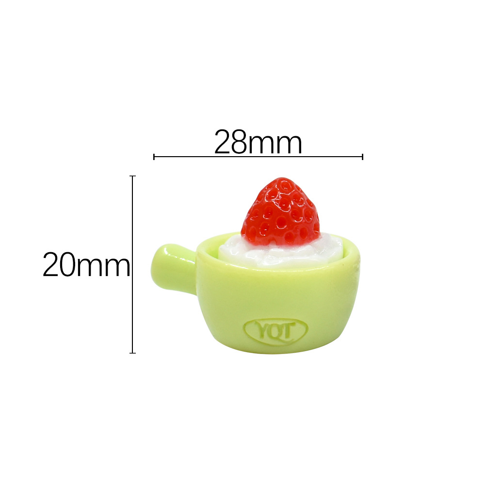 Tazón verde + fresas rojas