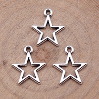 Pendentif étoile à cinq branches ouverte 14x16mm en alliage de zinc, ton argenté, pour mobile de bébé et artisanat